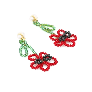 Handmade beaded flower drop earrings with red petals and green crystal accents