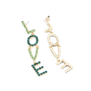 Detail of LOVE letter drop earrings featuring green gradient rhinestones on gold alloy