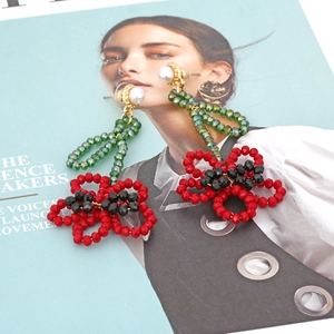 Handmade beaded flower earrings with red glass crystals and pearls in bohemian style