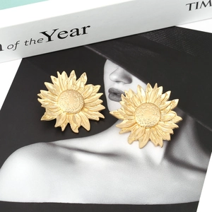 Statement matte gold sunflower earrings with vintage textured petals and a 3D floral design