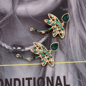Fashion dragonfly earrings with green crystal rhinestones on a gold alloy base