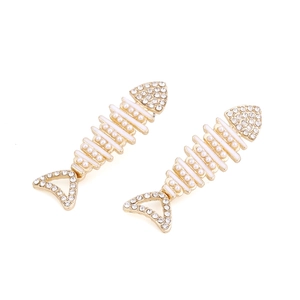 Exaggerated golden fishbone earrings with white pearls and sparkling rhinestone pavé