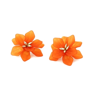 Bohemian orange woven resin flower earrings with gold stamens and matte finish