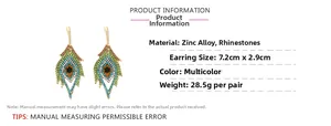 Detailed view of colorful peacock feather earrings with rhinestones and size dimensions