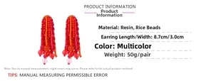 Detailed view showing dimensions 8.7x3.0cm of orange beaded fringe tassel earrings