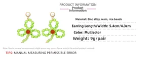 Spécifications des boucles d'oreilles trèfle en perles vertes avec clous de perles