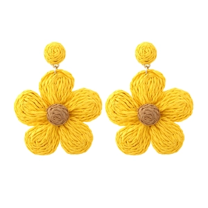 Bohemian handmade raffia flower drop earrings with yellow petals and woven center