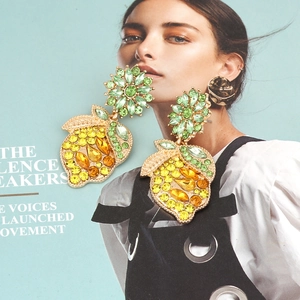 Fashionable lemon drop earrings with colorful crystals and green floral studs