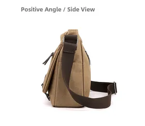 Side view of khaki canvas crossbody bag detailing adjustable strap and metal buckle