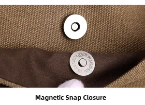 Detail of the magnetic snap closure on the durable canvas shoulder bag for men