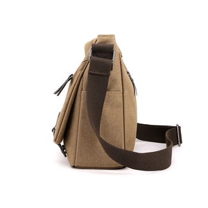 Khaki canvas messenger bag for men featuring adjustable brown strap and multi-layer design