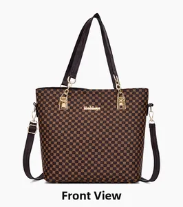 Detailed view of women's tote bag with geometric print and gold metal logo lettering