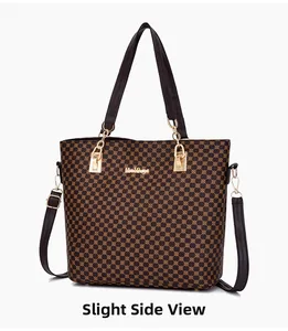 Side view of a brown patterned tote bag featuring gold hardware and a detachable strap