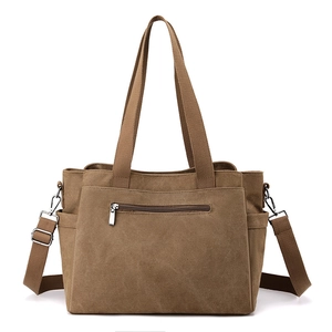 Large capacity dark brown canvas tote bag with shoulder strap and front zipper pocket