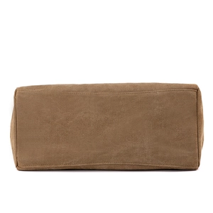 Minimalist canvas shoulder bag in khaki brown with a rectangular base and clean stitching