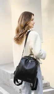 Mochila de cuero negro para mujer con gran capacidad y multibolsillos en exterior
