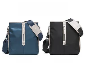 Detail view of Oxford fabric shoulder bags in blue and black with waterproof texture