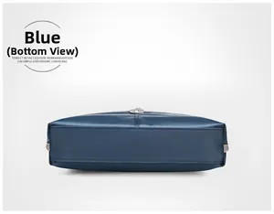 Detailed bottom view of blue oxford fabric bag showing precise stitching and metallic hardware