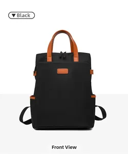 Vista frontale dello zaino porta PC nero impermeabile con dettagli in pelle marrone