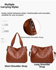 Detail of brown quilted shoulder bag showing detachable metal strap buckles and stitching