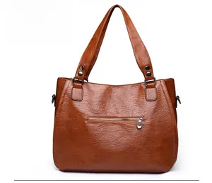 Rear view of brown large tote bag showing back zipper pocket and high-quality PU leather