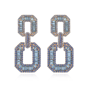 Golden geometric drop earrings with blue crystals in tiered octagonal chain link design