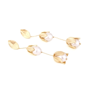 Long gold tassel earrings with textured leaves and pearl tulip bud drop accents