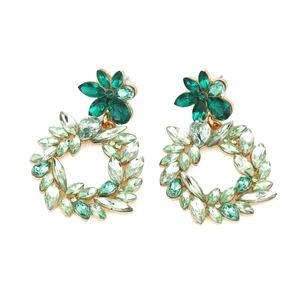 Vintage gold hollow flower earrings with green rhinestones and sparkling crystals