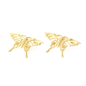Detailed view of golden butterfly earrings with intricate hollowed-out metal wing textures