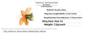 Detail view of large orange acrylic flower ring with specific size and material specs