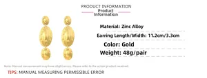Detailed view of large gold textured oval earrings in zinc alloy with exact dimensions