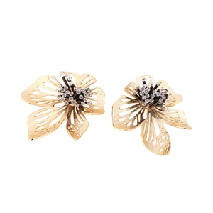 Golden hollow flower earrings with rhinestone centers and layered textured petals