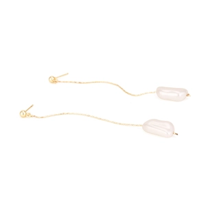 Elegant gold chain earrings featuring irregular baroque pearl drops on a white background