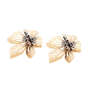 Golden handmade beaded flower earrings with textured hollow petals and rhinestones