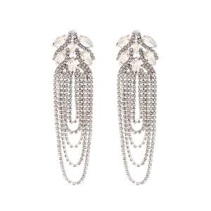 Detailed view of silver long tassel earrings with marquise-cut rhinestones and crystal fringe