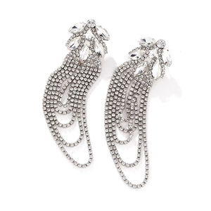 Detailed view of silver-toned fringe earrings with sparkling rhinestone tassels