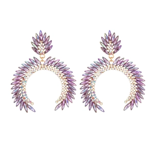 Exaggerated C-shaped gold-tone earrings with purple crystals and colorful rhinestones
