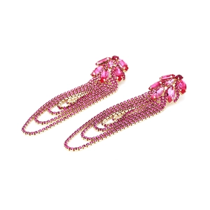 Detail of rose pink rhinestone tassel earrings with gold-tone geometric crystal fringe