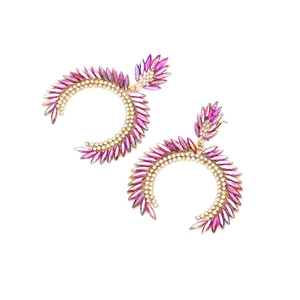 Detailed view of C-shaped earrings with purple marquise crystals and AB rhinestones