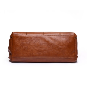 Caramel brown leather tote bag featuring contrast stitching and a large capacity design