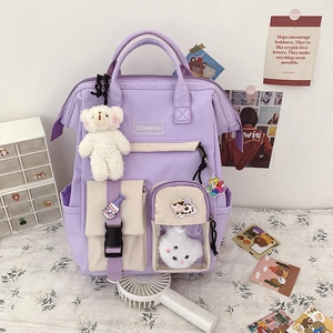 Japanese style lavender canvas backpack with cute badges and plush bear charm for students