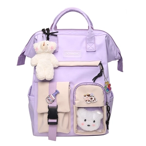 Purple nylon school backpack for students with plush bear and cute decorative patches