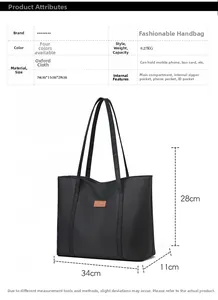 Detail view of black oxford cloth tote bag showing 34x11x28cm dimensions and weight