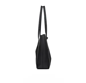 Side view of large black nylon tote bag showing durable texture and slim shoulder straps