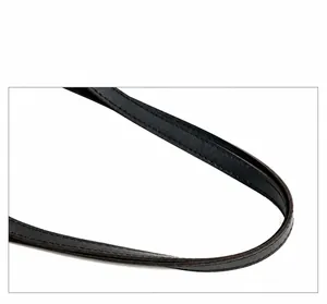 Detail of black leather shoulder strap featuring durable double stitching and smooth edges