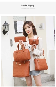 Close-up of five-piece set woven orange faux leather handbags with gold hardware detail