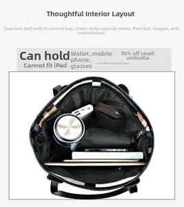 Interior view of black PU leather tote bag showing compartments and large capacity