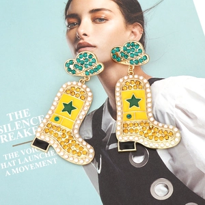 Luxe yellow cowboy boot earrings with rhinestones, pearls and green star details