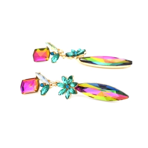 Detailed macro view of bohemian rainbow crystal drop earrings with geometric gems