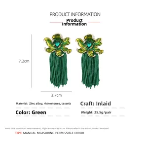 Detailed view of green flower tassel earrings showing 7.2cm length and material specs